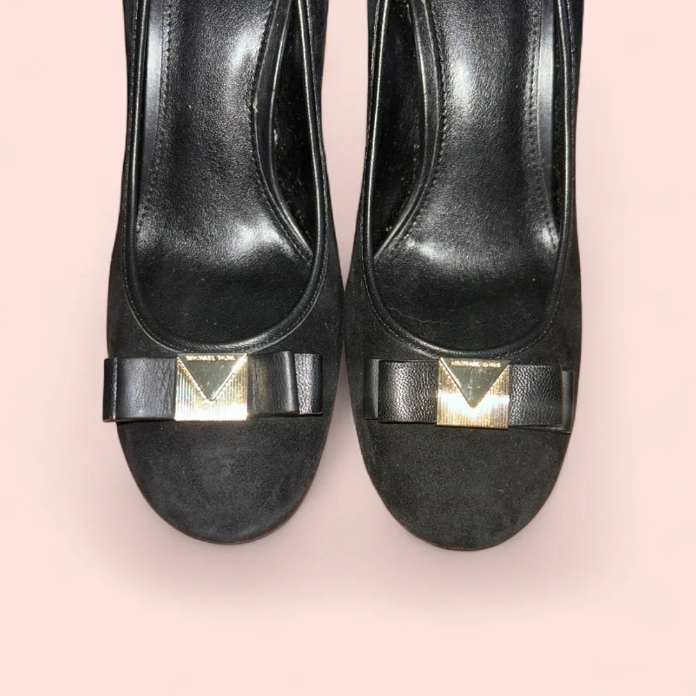 Michael Kors Black Flats with Sophisticated Design